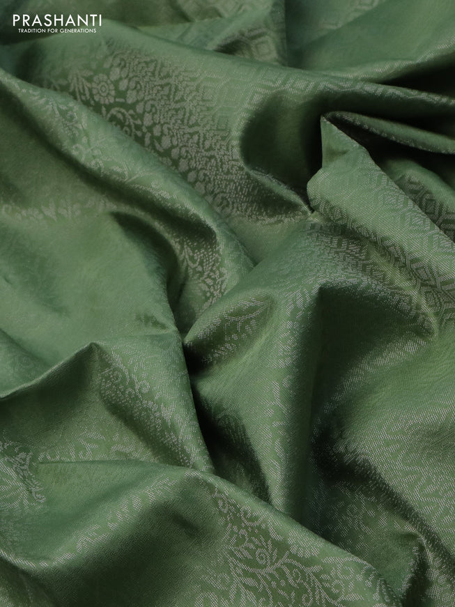 Pure soft silk saree pastel green with allover silver zari woven brocade weaves in borderless style