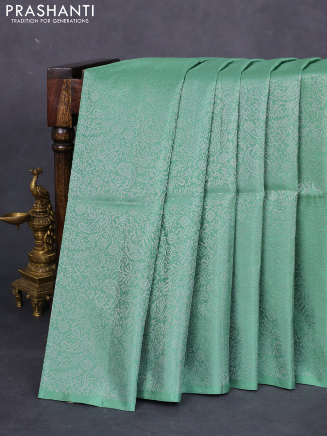 Pure soft silk saree pastel green with allover silver zari woven brocade weaves in borderless style