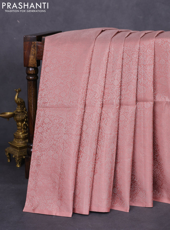 Pure soft silk saree pastel peach with allover silver zari woven brocade weaves in borderless style
