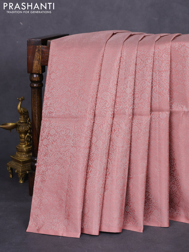 Pure soft silk saree pastel peach with allover silver zari woven brocade weaves in borderless style