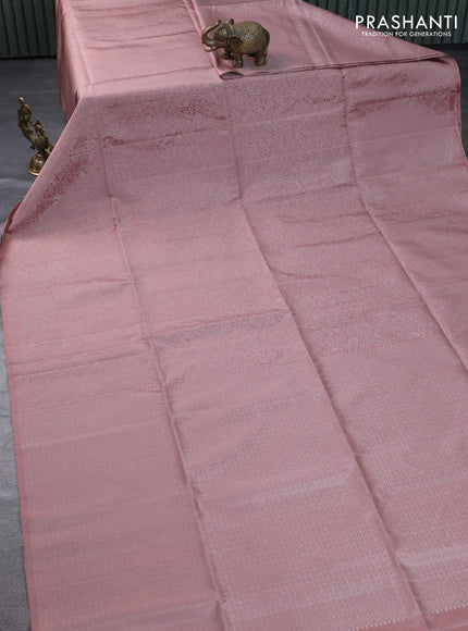 Pure soft silk saree pastel peach with allover silver zari woven brocade weaves in borderless style