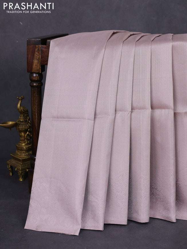 Pure soft silk saree beige with allover silver zari woven brocade weaves and rich silver zari border