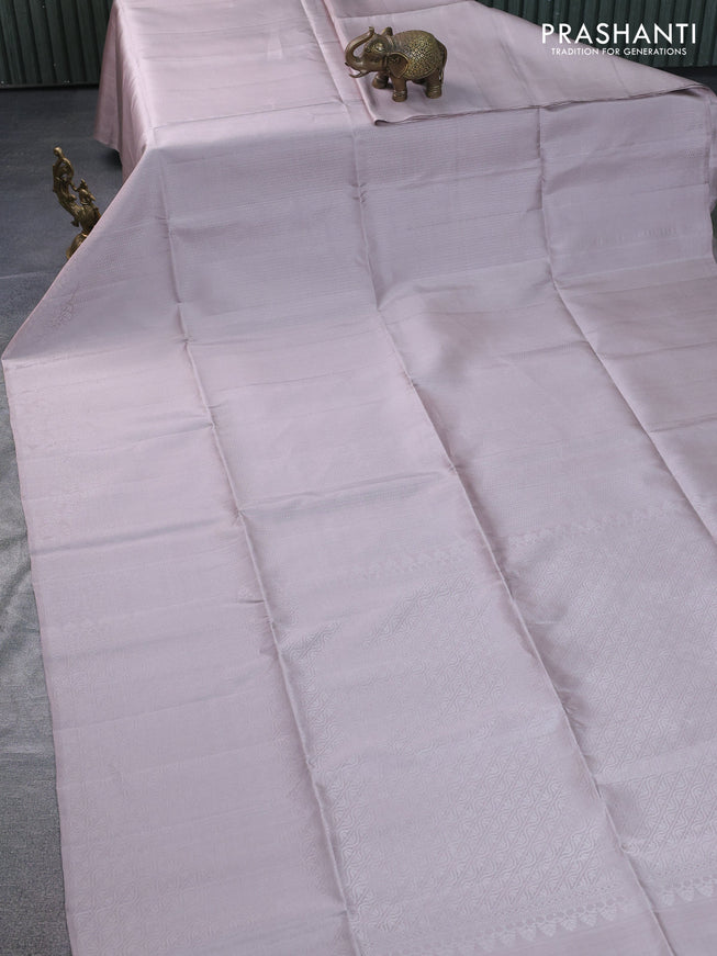 Pure soft silk saree beige with allover silver zari woven brocade weaves and rich silver zari border