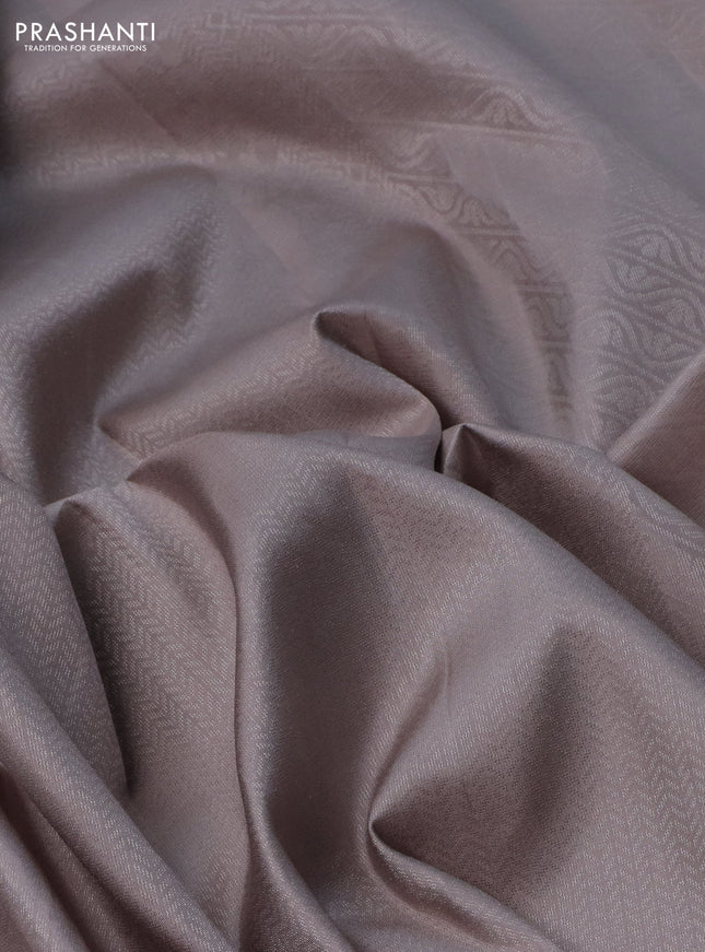 Pure soft silk saree beige with allover silver zari woven brocade weaves and rich silver zari border