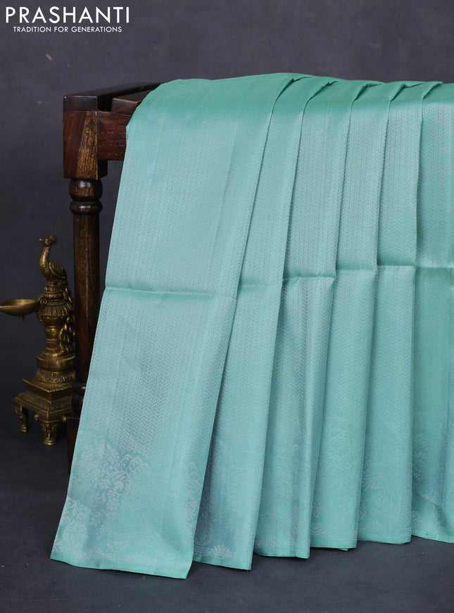 Pure soft silk saree pastel green with allover silver zari woven brocade weaves and rich silver zari border