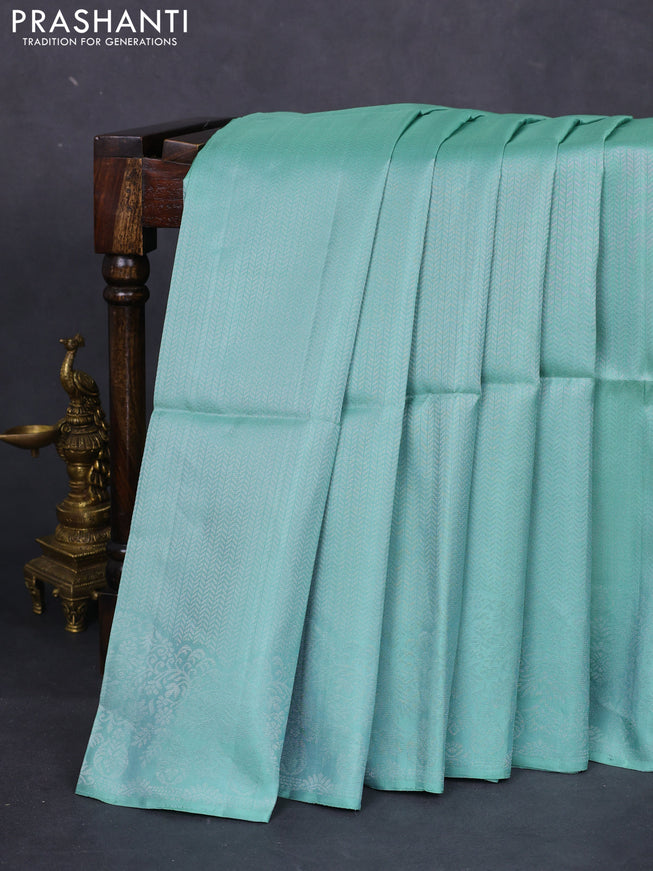 Pure soft silk saree pastel green with allover silver zari woven brocade weaves and rich silver zari border