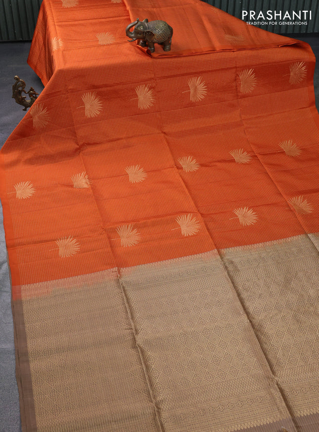 Pure soft silk saree orange and chikku shade with allover small zari checks & buttas in borderless style