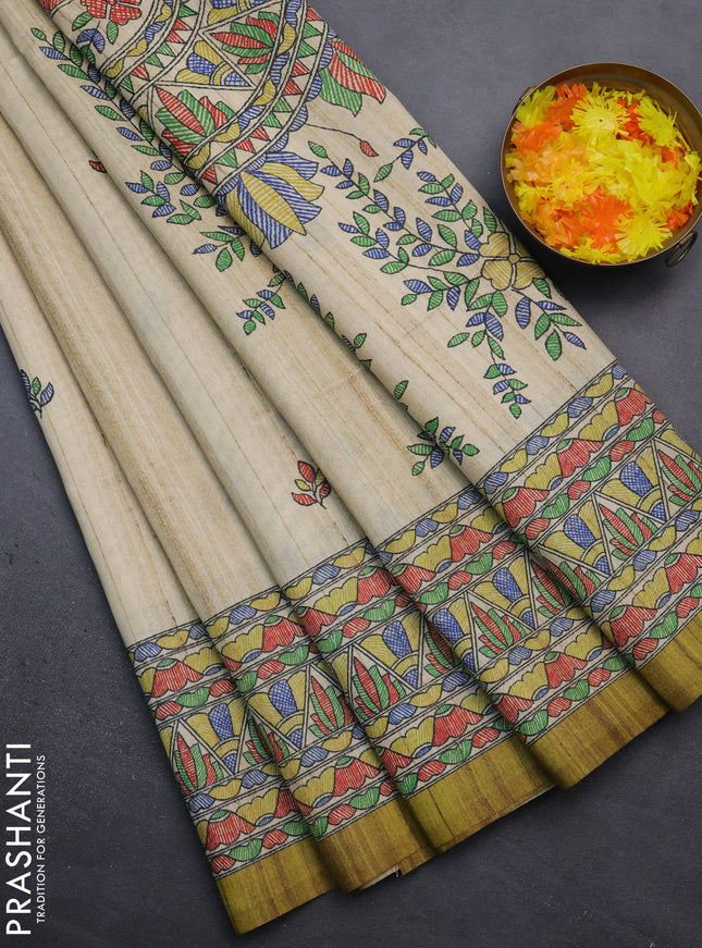 Semi tussar saree beige and mehendi green with madhubani prints and printed border