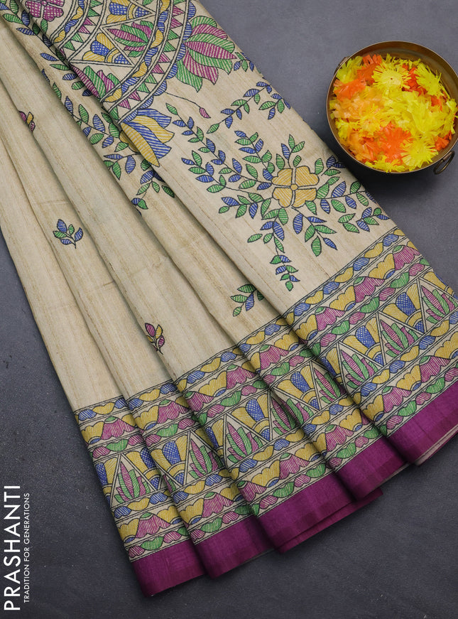 Semi tussar saree beige and purple with madhubani prints and printed border