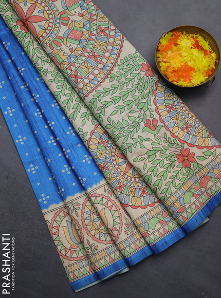 Semi tussar saree cs blue and beige with bandhini butta prints and mandhubani printed pallu
