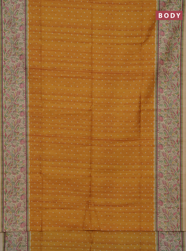 Semi tussar saree mustard yellow and sandal with bandhini butta prints and printed border