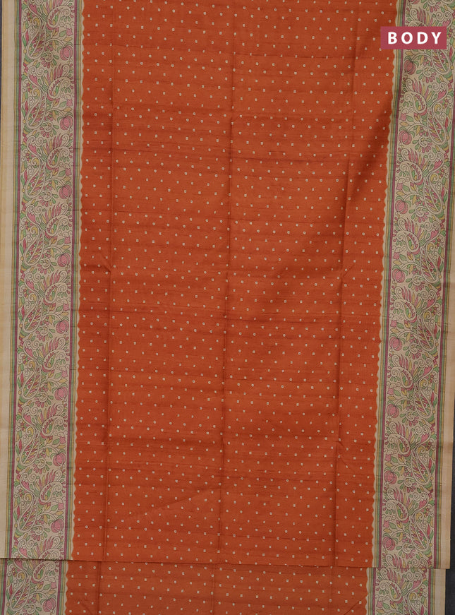 Semi tussar saree orange and sandal with bandhini butta prints and printed border