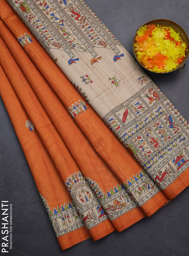 Semi tussar saree orange and beige with allover walri butta prints and printed border