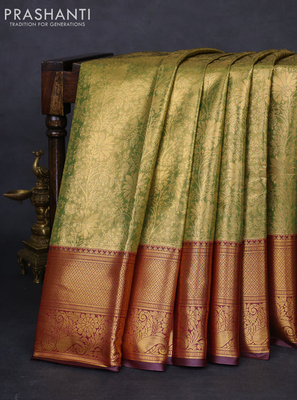 Bangalori tissue silk saree dual shade of green and deep maroon with allover zari woven brocade weaves and long zari woven border
