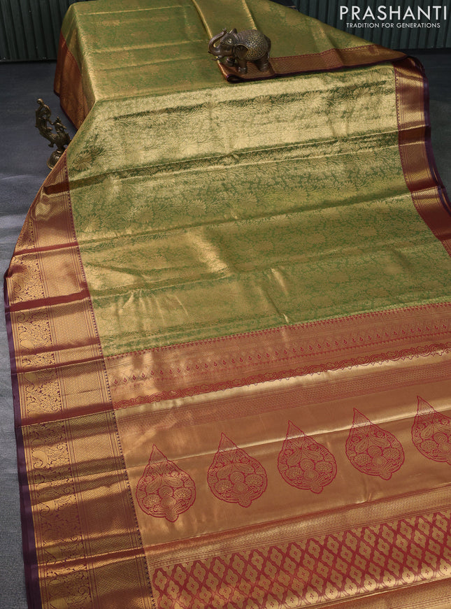 Bangalori tissue silk saree dual shade of green and deep maroon with allover zari woven brocade weaves and long zari woven border