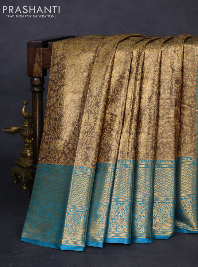 Bangalori tissue silk saree gold and peacock blue with allover zari woven brocade weaves and long zari woven border