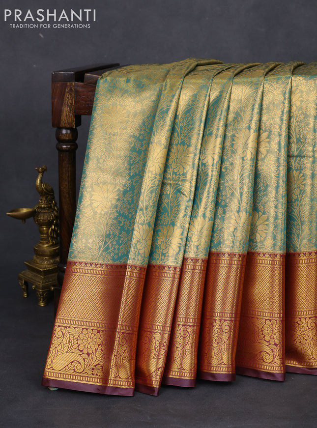 Bangalori tissue silk saree teal green and deep maroon with allover zari woven brocade weaves and long zari woven border