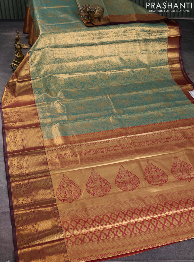 Bangalori tissue silk saree teal green and deep maroon with allover zari woven brocade weaves and long zari woven border
