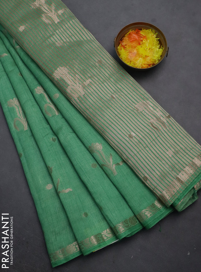 Semi raw silk saree teal green shade with zari woven floral buttas and small zari woven border
