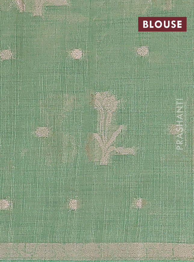 Semi raw silk saree teal green shade with zari woven floral buttas and small zari woven border