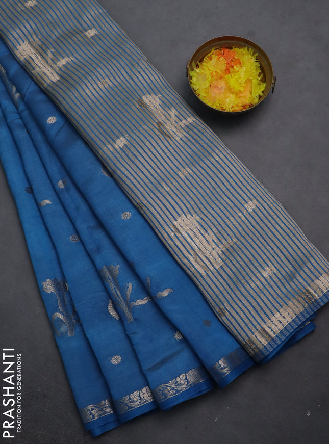 Semi raw silk saree cs blue with zari woven floral buttas and small zari woven border