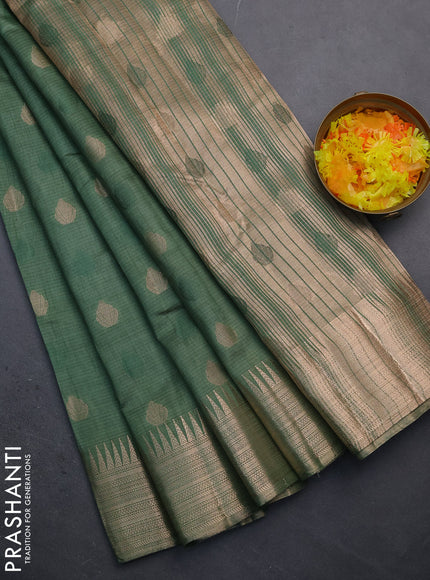 Semi raw silk saree green shade with thread & zari woven buttas and temple design zari woven border