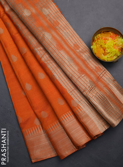 Semi raw silk saree orange with thread & zari woven buttas and temple design zari woven border