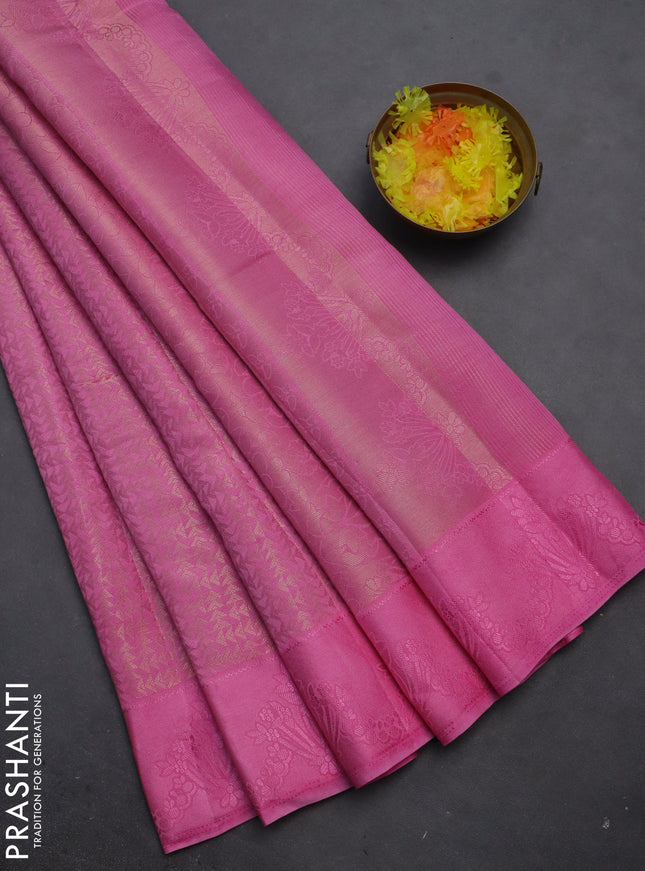 Semi raw silk saree light pink with allover zari weaves and simple border