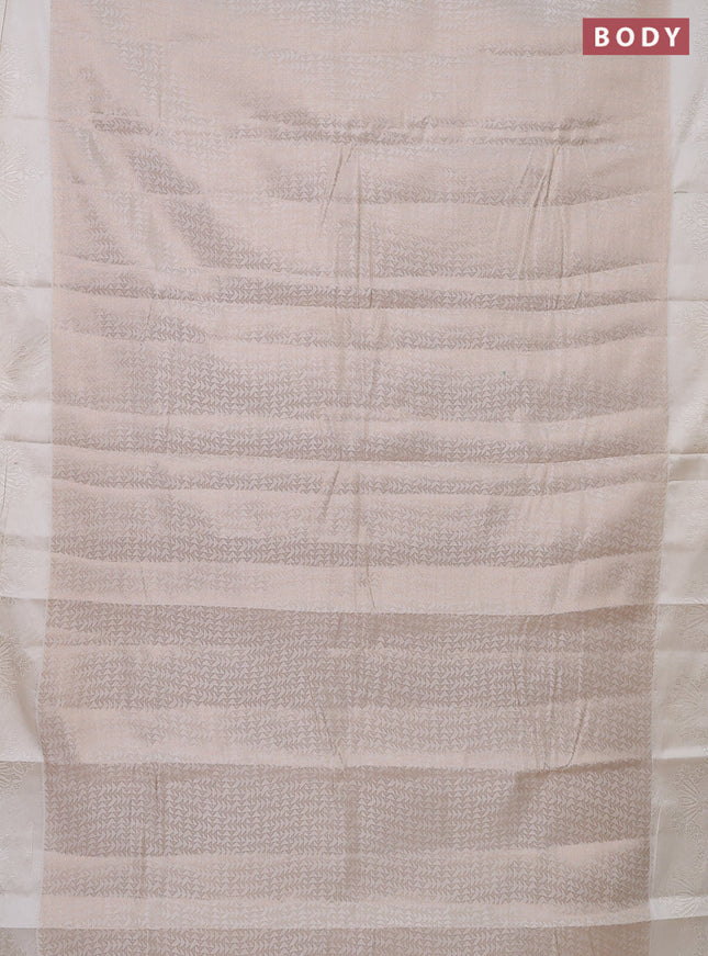 Semi raw silk saree off white with allover zari weaves and simple border