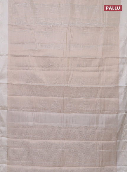 Semi raw silk saree off white with allover zari weaves and simple border