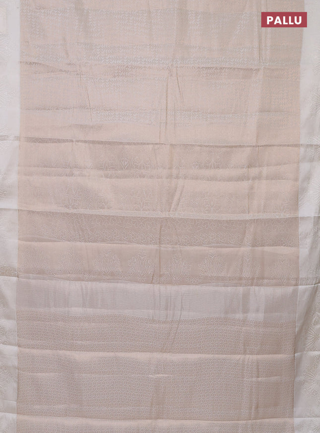 Semi raw silk saree off white with allover zari weaves and simple border