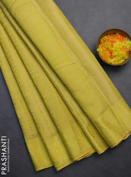 Semi raw silk saree lime yellow with allover zari weaves and simple border