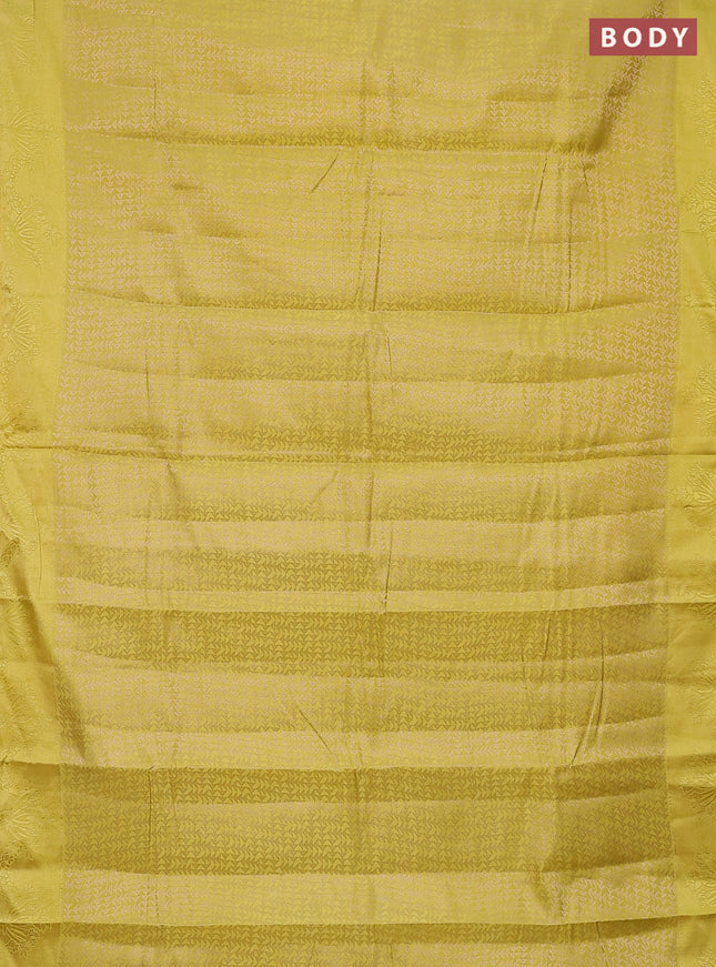 Semi raw silk saree lime yellow with allover zari weaves and simple border