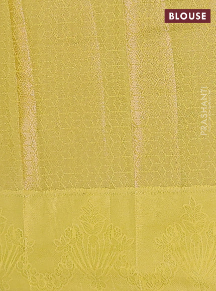 Semi raw silk saree lime yellow with allover zari weaves and simple border