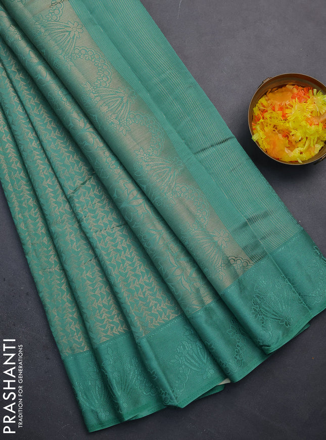 Semi raw silk saree teal green shade with allover zari weaves and simple border