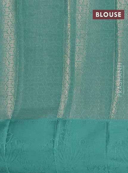 Semi raw silk saree teal green shade with allover zari weaves and simple border