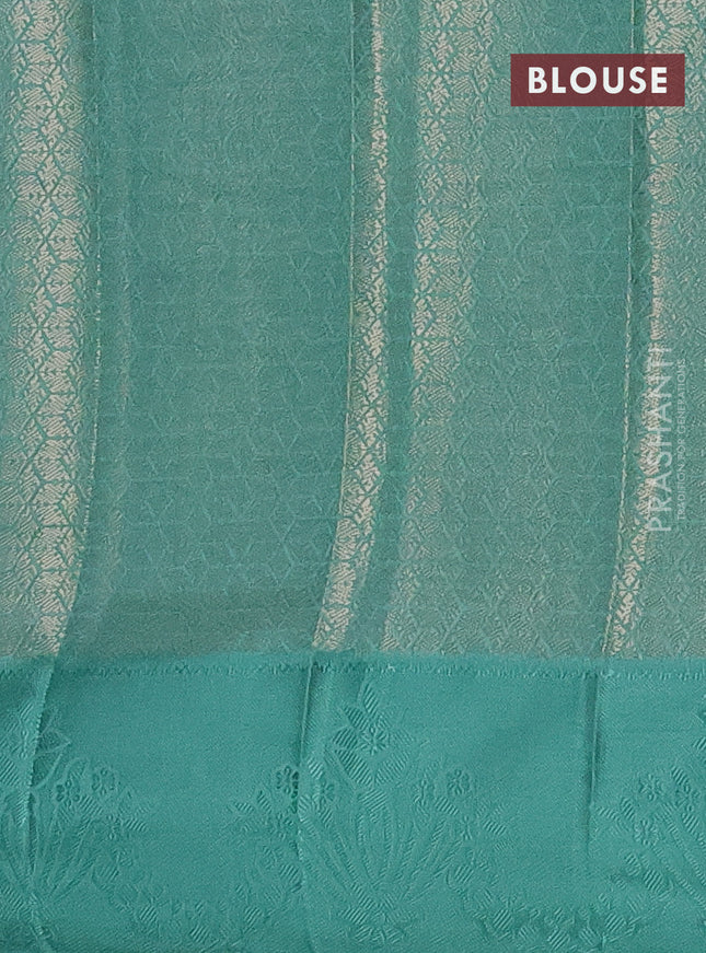 Semi raw silk saree teal green shade with allover zari weaves and simple border