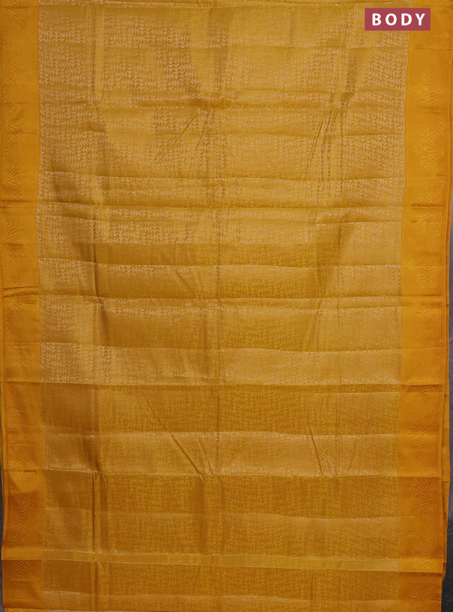 Semi raw silk saree mango yellow with allover zari weaves and simple border