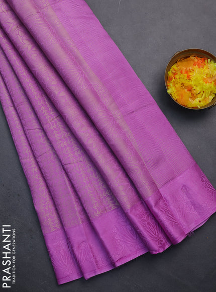 Semi raw silk saree lavender with allover zari weaves and simple border