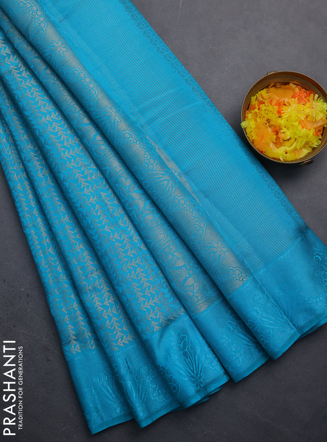 Semi raw silk saree teal blue with allover zari weaves and simple border
