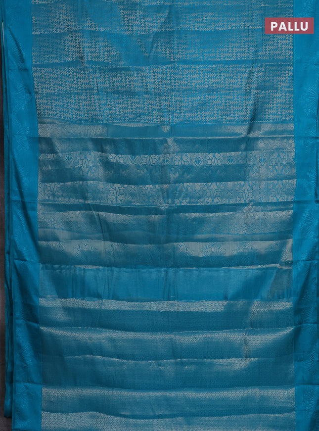 Semi raw silk saree teal blue with allover zari weaves and simple border