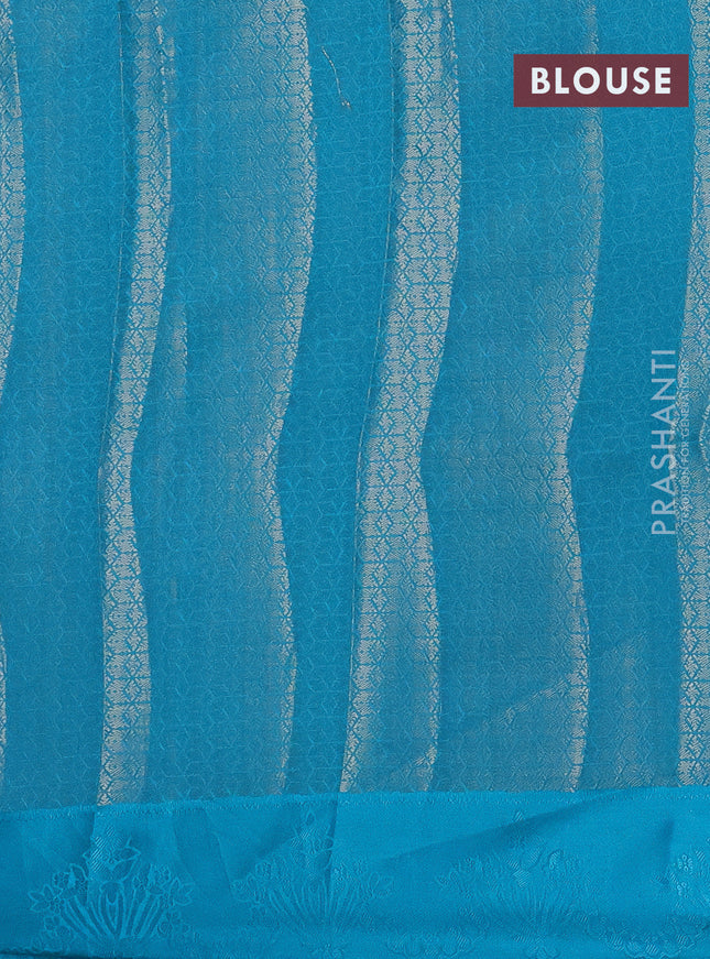 Semi raw silk saree teal blue with allover zari weaves and simple border