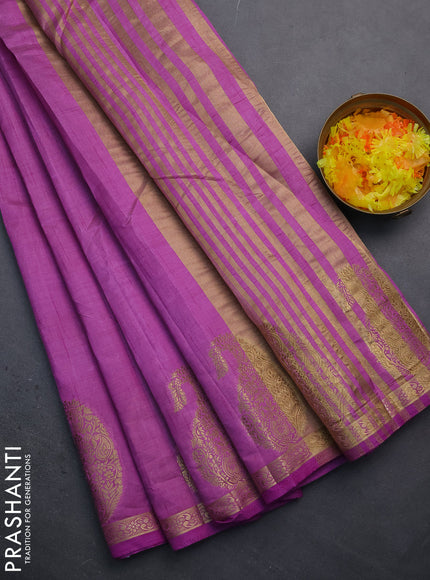 Semi raw silk saree lavender with plain body and paisley design zari woven butta border