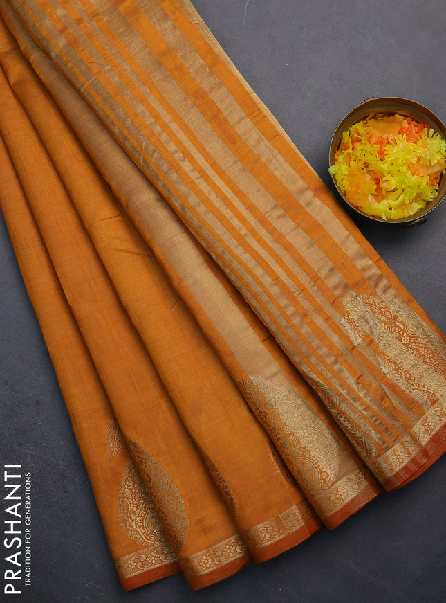 Semi raw silk saree mustard yellow with plain body and paisley design zari woven butta border