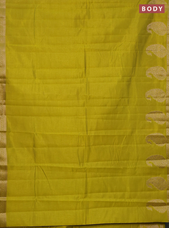 Semi raw silk saree lime green with plain body and paisley design zari woven butta border