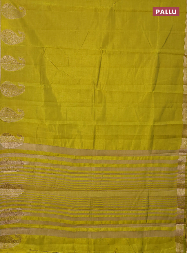 Semi raw silk saree lime green with plain body and paisley design zari woven butta border