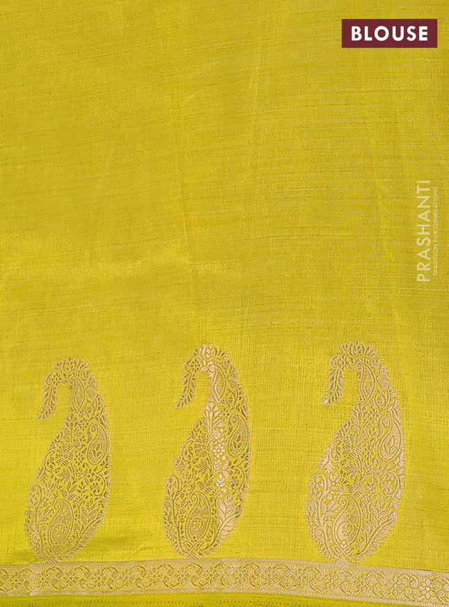 Semi raw silk saree lime green with plain body and paisley design zari woven butta border