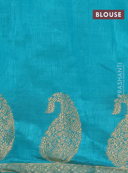 Semi raw silk saree teal shade with plain body and paisley design zari woven butta border