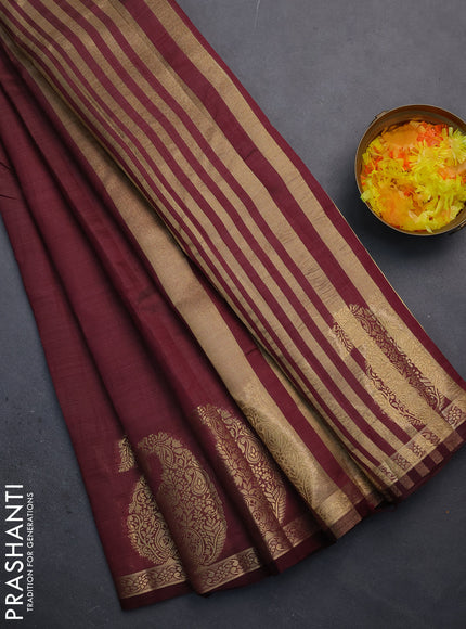 Semi raw silk saree wine shade with plain body and paisley design zari woven butta border