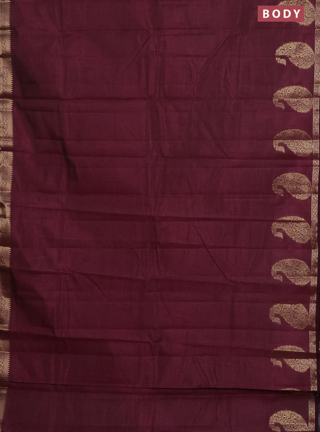 Semi raw silk saree wine shade with plain body and paisley design zari woven butta border